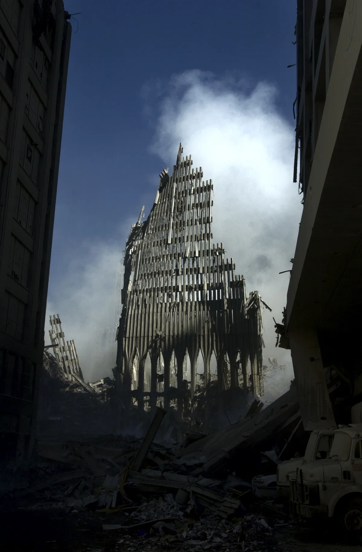 New York, N.Y. (Sept. 14, 2001) – What is left of the south tower of the World Trade Center in New York City, stands like a tombstone among the debris and devastation caused by the Sep. 11, terrorist attack. U.S. Navy photo by Journalist 1st Class Preston.