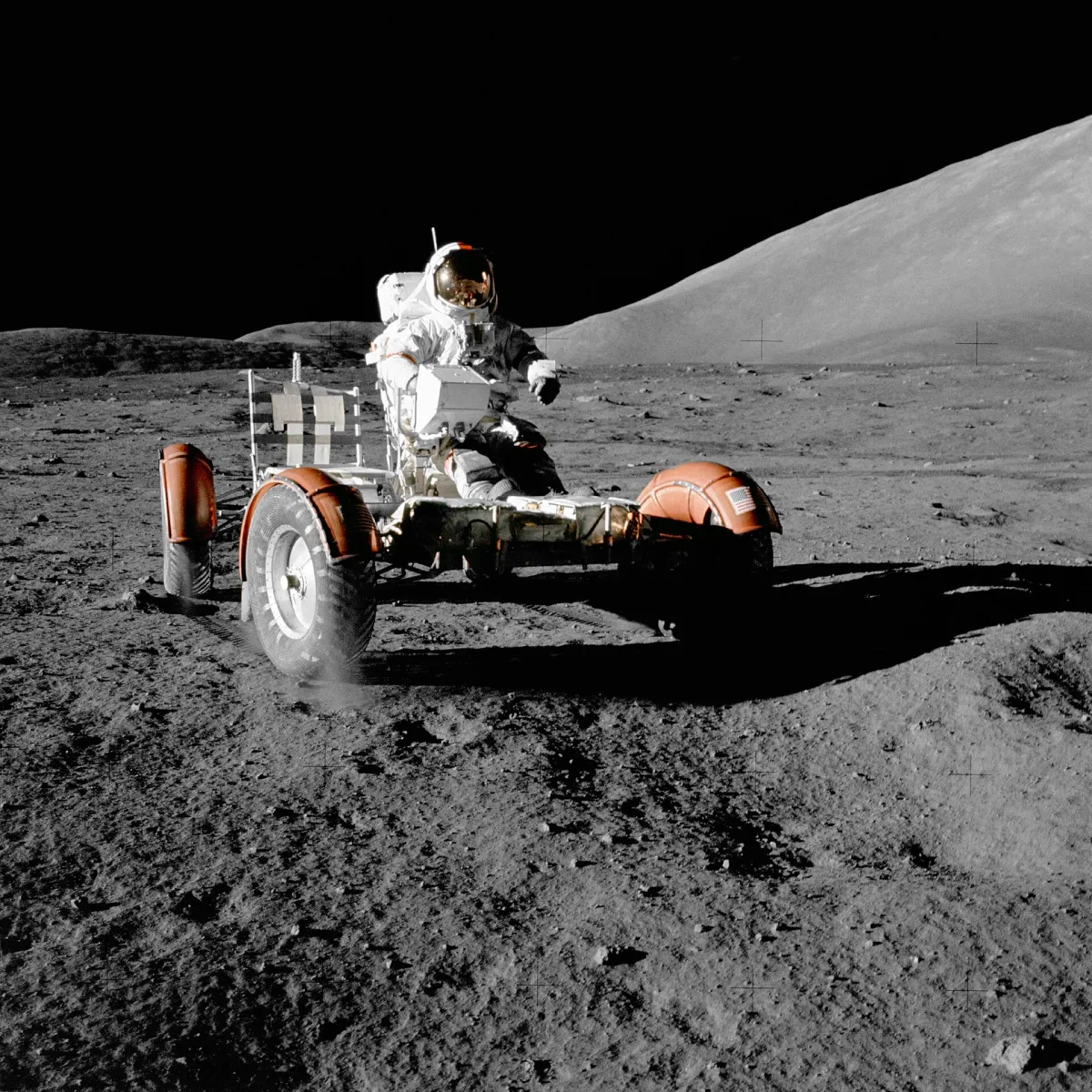 Apollo 17 mission, 12 December 1972. Astronaut Eugene A. Cernan, commander, makes a short checkout of the Lunar Roving Vehicle (LRV) during the early part of the first Apollo 17 Extravehicular Activity (EVA-1) at the Taurus-Littrow landing site. This view of the "stripped down" LRV is prior to loadi