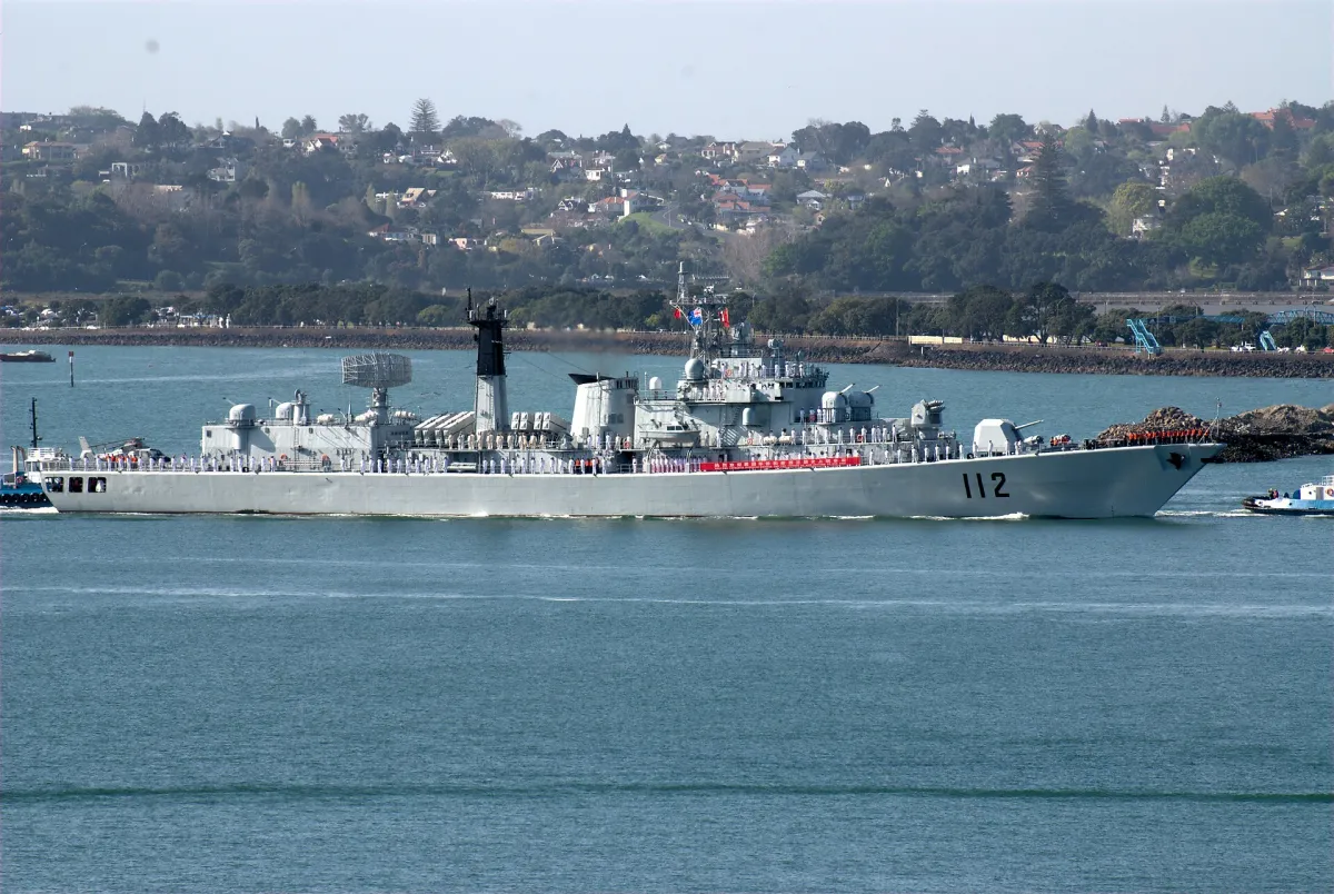 The Peoples Liberation Army Navy Ship HARBIN (DDG112), a LUHU Destroyer, on a visit to Auckland, New Zealand. New Zealand Defence Force PRess Release The red banner along the side of the deck is subtitled in English with the words: "WELCOME PATRIOTIC OVERSEAS CHINESE AND THE FRIENDS OF NEW ZEALAND T