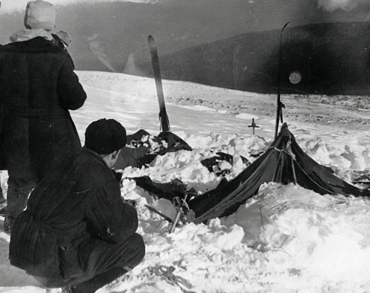 A view of the tent as the rescuers found it on Feb. 26, 1959. The tent had been cut open from inside, and most of the skiers had fled in socks or barefoot. Photo taken by soviet authorities at the camp of the Dyatlov Pass incident and anexed to the legal inquest that investigated the deaths.