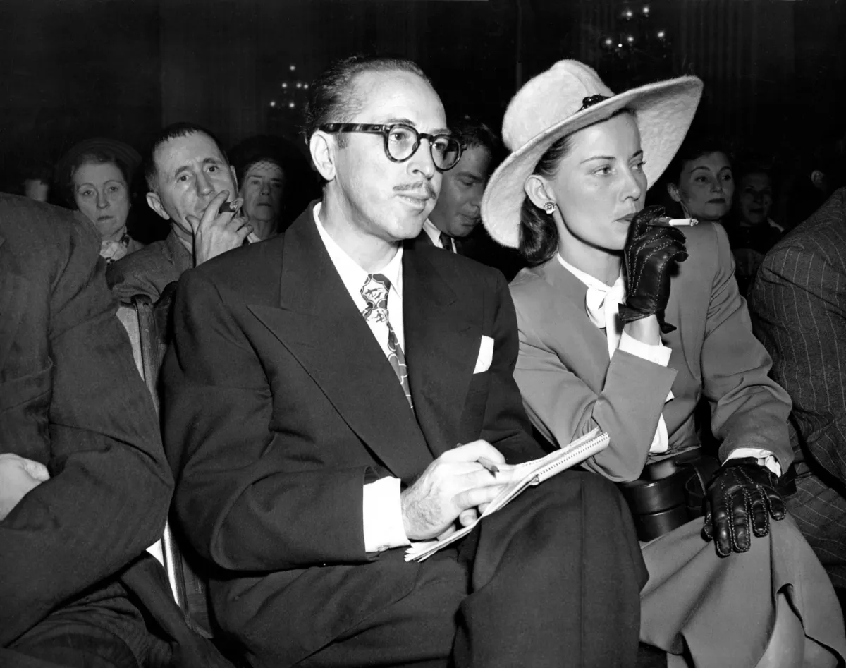 Colorado screenwriter and novelist Dalton Trumbo with Wife Cleo at House Un-American Activities Committee hearings, 1947. German poet and Marxist Bertolt Brecht is visible in the background.